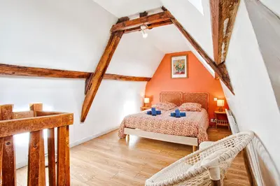 Un ou plusieurs lits dans un hébergement de l'établissement L'Oasis - Chaleureux duplex - Centre Ville de Caen