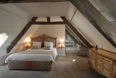 Un ou plusieurs lits dans un hébergement de l'établissement Domaine de Bayeux