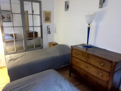 Un ou plusieurs lits dans un hébergement de l'établissement Gîte de la lanterne