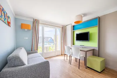 Télévision ou salle de divertissement dans l'établissement Némo - Appartement avec Terrasse