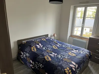 Un ou plusieurs lits dans un hébergement de l'établissement 1 appartement neuf centre flers accès facile proche gare et commodités