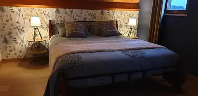 Un ou plusieurs lits dans un hébergement de l'établissement LE CHALET