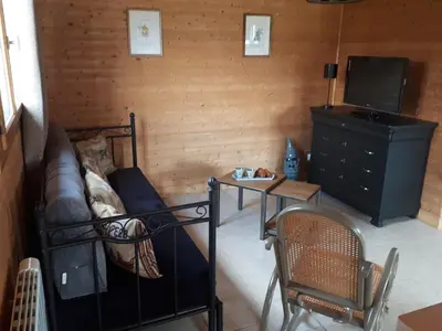 Télévision ou salle de divertissement dans l'établissement LE CHALET