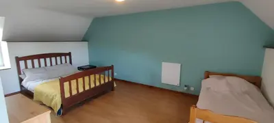 Un ou plusieurs lits dans un hébergement de l'établissement Loge de la Saire