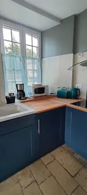Cuisine ou kitchenette dans l'établissement Loge de la Saire