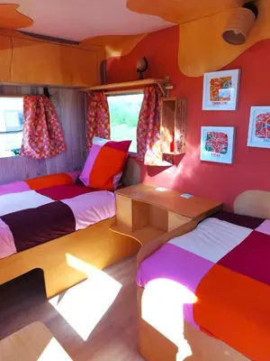 Un ou plusieurs lits dans un hébergement de l'établissement Camping Les Ronds Duval face aux îles anglo-normandes