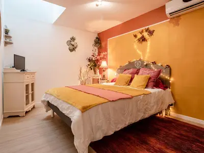 Un ou plusieurs lits dans un hébergement de l'établissement Holiday Home La Villa bleue by Interhome