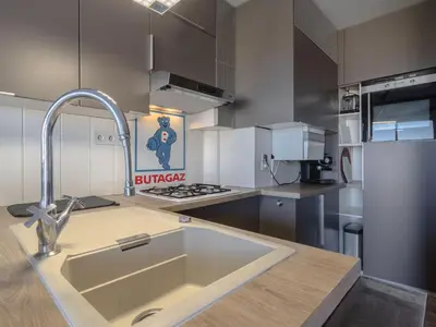 Cuisine ou kitchenette dans l'établissement Apartment Les Dunes by Interhome