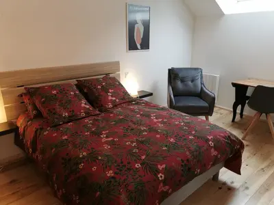 Un ou plusieurs lits dans un hébergement de l'établissement Appartement à Valognes : Entre Terre et Mer