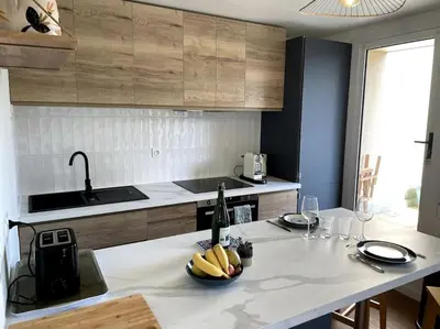 Cuisine ou kitchenette dans l'établissement La terrasse du golf
