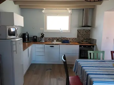 Cuisine ou kitchenette dans l'établissement L'Avoynette