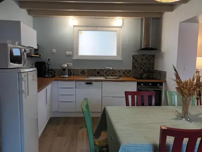 Cuisine ou kitchenette dans l'établissement L'Avoynette
