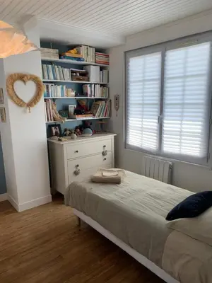Un ou plusieurs lits dans un hébergement de l'établissement Chez Viviane