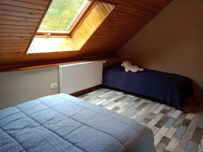Un ou plusieurs lits dans un hébergement de l'établissement GITE LE PRESSOIR DE LA BAIE 20 km DU MONT ST MICHEL