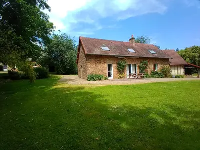 Jardin de l'établissement GITE LE PRESSOIR DE LA BAIE 20 km DU MONT ST MICHEL