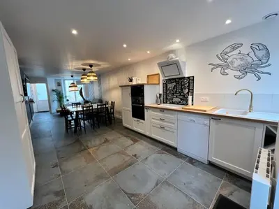 Cuisine ou kitchenette dans l'établissement Le Crabe Vert