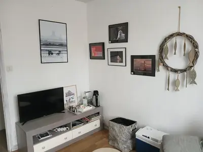 Télévision ou salle de divertissement dans l'établissement Villa Joret