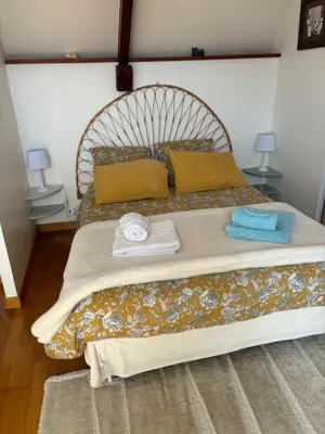 Un ou plusieurs lits dans un hébergement de l'établissement La Maisonnette