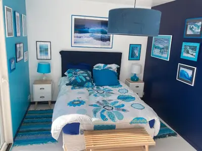 Un ou plusieurs lits dans un hébergement de l'établissement La Maison Bleue-Sciotot-Les Pieux