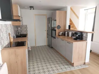 Cuisine ou kitchenette dans l'établissement La Cigogne, moderne, spacieux et bien placé