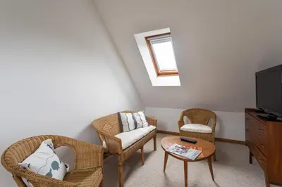 Télévision ou salle de divertissement dans l'établissement Le clos de la Roche Angevin - Charmante maison 6 voyageurs