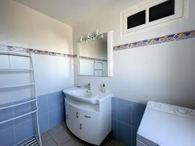 Un ou plusieurs lits dans un hébergement de l'établissement Maison paisible proche de la plage avec jardin et équipements complets - FR-1-361-491