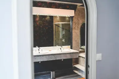 Salle de bains dans l'établissement La Fontaine Dort