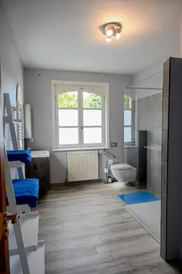 Salle de bains dans l'établissement La Fontaine Dort