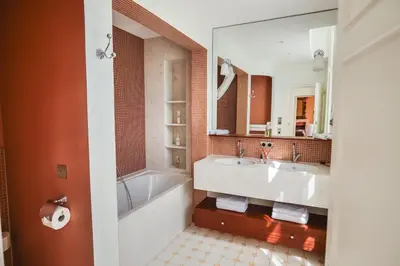 Salle de bains dans l'établissement Château Hôtel - Domaine de Coeurmandie