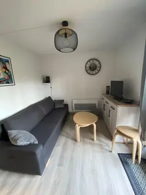 Coin salon dans l'établissement Cabourg - Appartement - 4 pers - 1 ch - Piscine