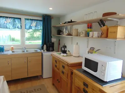 Cuisine ou kitchenette dans l'établissement La Vesiniere/BelleFleur gite