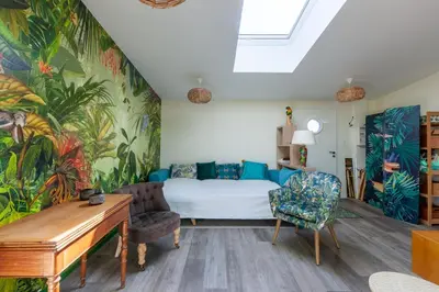 Coin salon dans l'établissement La Halte des Miquelots - Appt avec jardin