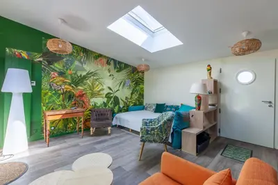 Coin salon dans l'établissement La Halte des Miquelots - Appt avec jardin