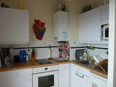 Cuisine ou kitchenette dans l'établissement Studio avec vue sur mer à Granville. Plage à 3 min