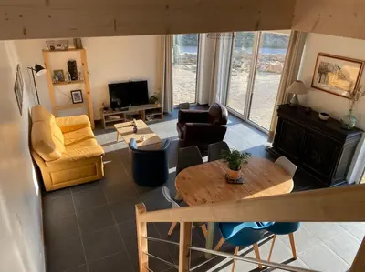 Télévision ou salle de divertissement dans l'établissement La cabane du banc José