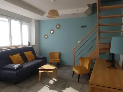 Coin salon dans l'établissement Maison Bateau