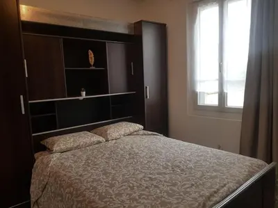 Un ou plusieurs lits dans un hébergement de l'établissement Maison Bateau