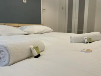 Un ou plusieurs lits dans un hébergement de l'établissement Saphir, Hyper centre ville au calme au fond d'une impasse