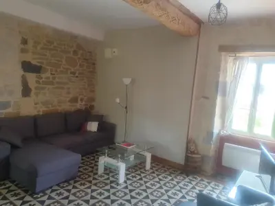 Coin salon dans l'établissement La Ferme de Barville & SPA