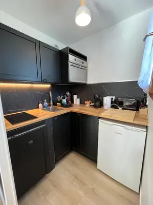 Cuisine ou kitchenette dans l'établissement Côté Plage & Balcon