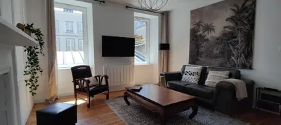 Télévision ou salle de divertissement dans l'établissement Le Corsaire