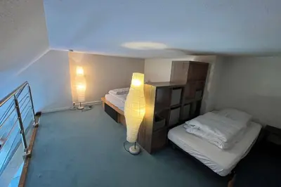 Un ou plusieurs lits dans un hébergement de l'établissement Charming cocoon