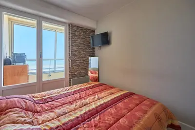 Un ou plusieurs lits dans un hébergement de l'établissement La Longue Vue - Appt face à la mer