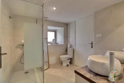 Salle de bains dans l'établissement Ferme de la begossiere