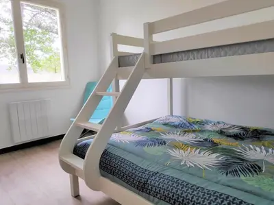 Un ou plusieurs lits dans un hébergement de l'établissement Baie du Mont Saint Michel - Maison Bord de Mer