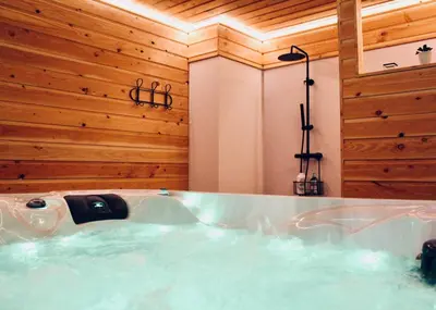 Plan de l'établissement Duplex accès jacuzzi illimité T
