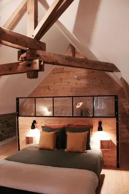 Un ou plusieurs lits dans un hébergement de l'établissement Duplex accès jacuzzi illimité T