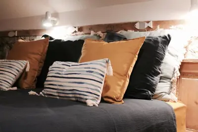 Un ou plusieurs lits dans un hébergement de l'établissement Duplex accès jacuzzi illimité T