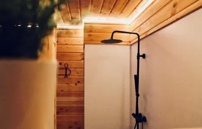 Salle de bains dans l'établissement Duplex accès jacuzzi illimité M