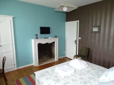 Télévision ou salle de divertissement dans l'établissement Manoir Saint Martin Chambres d'hôtes